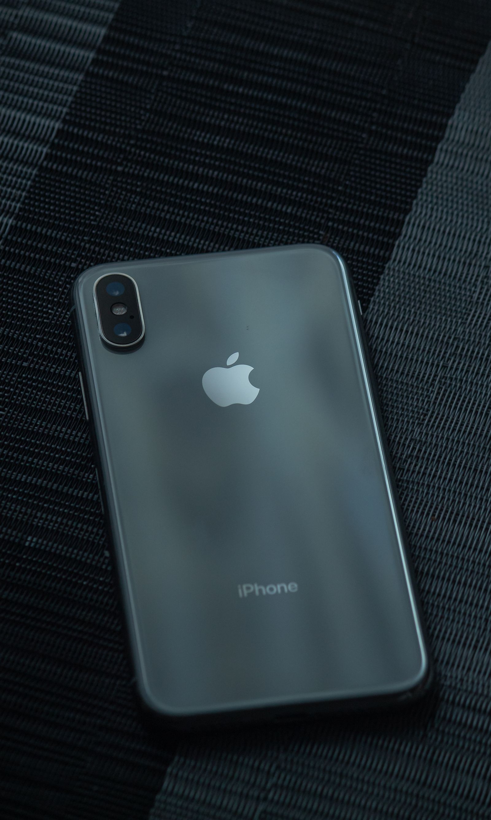 Close-up photograph of a real Apple iPhone