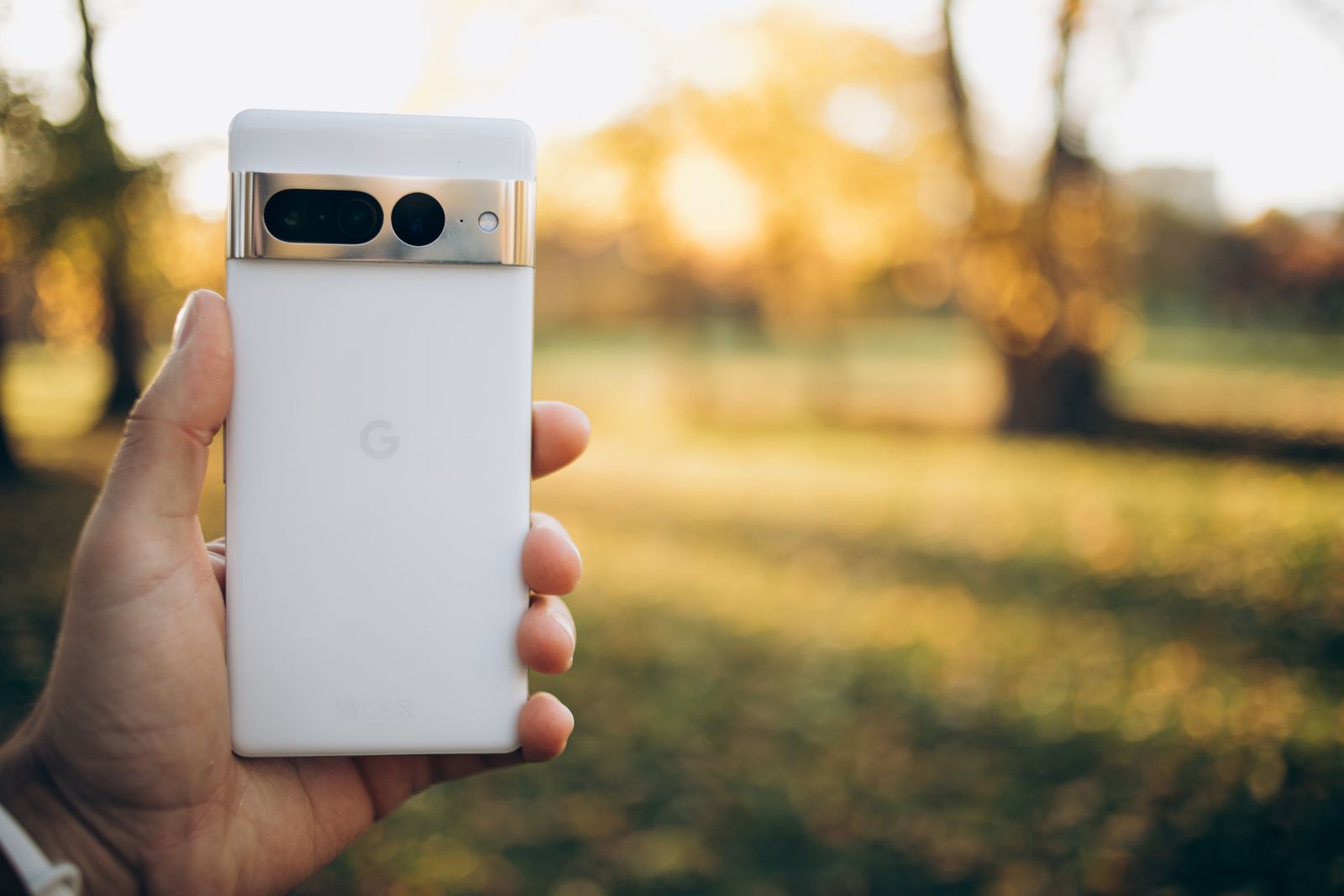 A real Google Pixel smartphone held outdoors